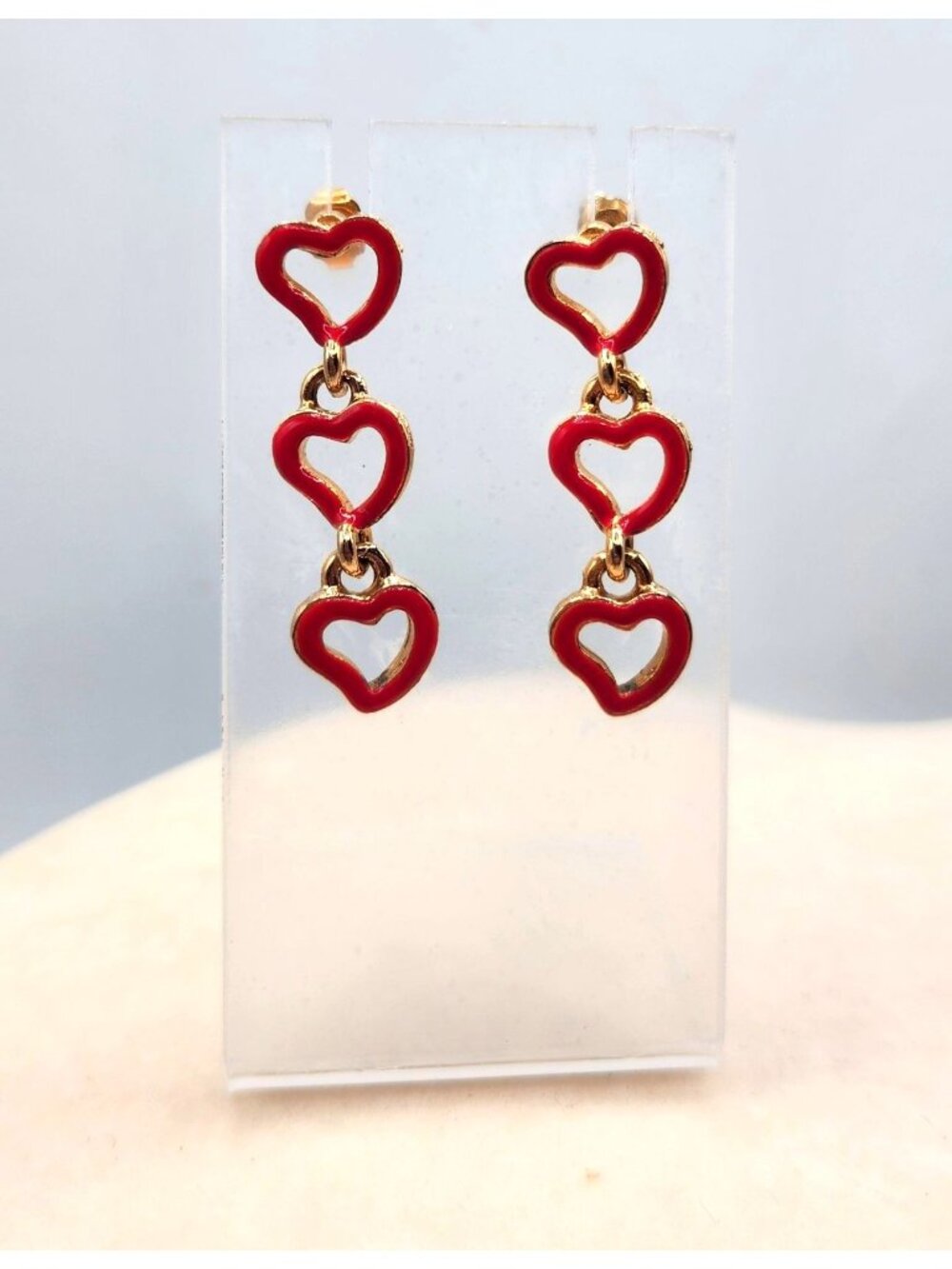 Red Enamel Triple Heart Dangle Earrings With Gold Tone Accent